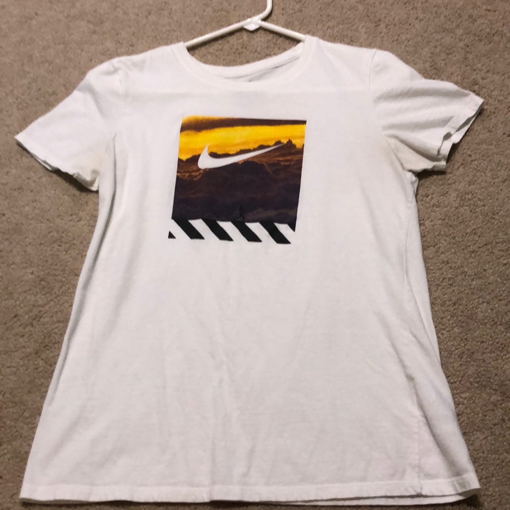 White nike shirt.